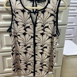 Sleeveless black white pink blouse